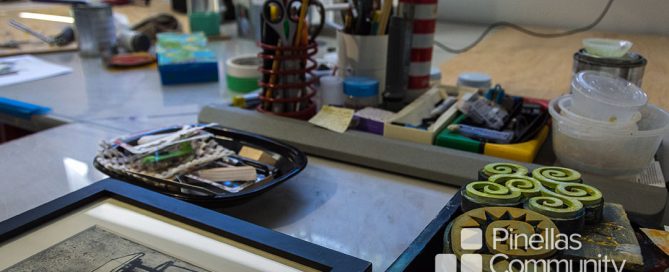 Lynn Foskett Pierson's art studio, close up of table filled with tools.