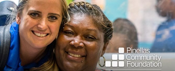 Two smiling women at the Boys & Girls Club