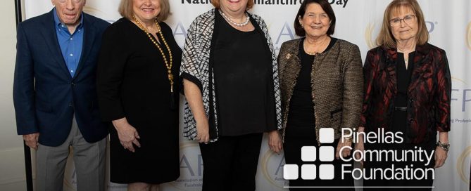 Former PCF Board Member Sandra Diamond poses with guests after winning the Spirit of Philanthropy Award.