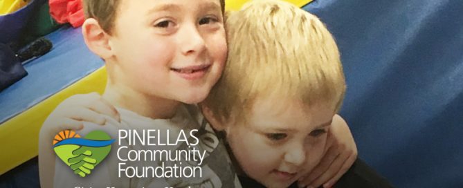 Two brothers hugging at The Arc Tampa Bay