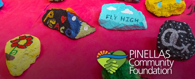 Colorful rocks painted by Girls Inc. participants.