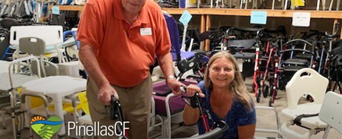 DAC staff members Joseph DiDomenico and Jody Armstrong examine the equipment.