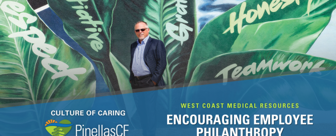 Randy Ware, Founder of WestCMR, stands by office mural.