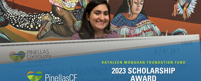 2023 Kathleen Monahan Foundation Fund Scholarship recipient Katerina Lecourezos holds an oversized check for $1,000 from Pinellas Community Foundation at a grant presentation ceremony last month at Tarpon Springs Cultural Center. She stands before a mural by Elizabeth Indianos depicting Tarpon Springs' history, including Native Americans and wildlife.