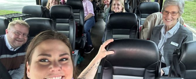 PCF staff, board members, and community partners ride a bus throughout Pinellas County for a close look at PCF's impact.