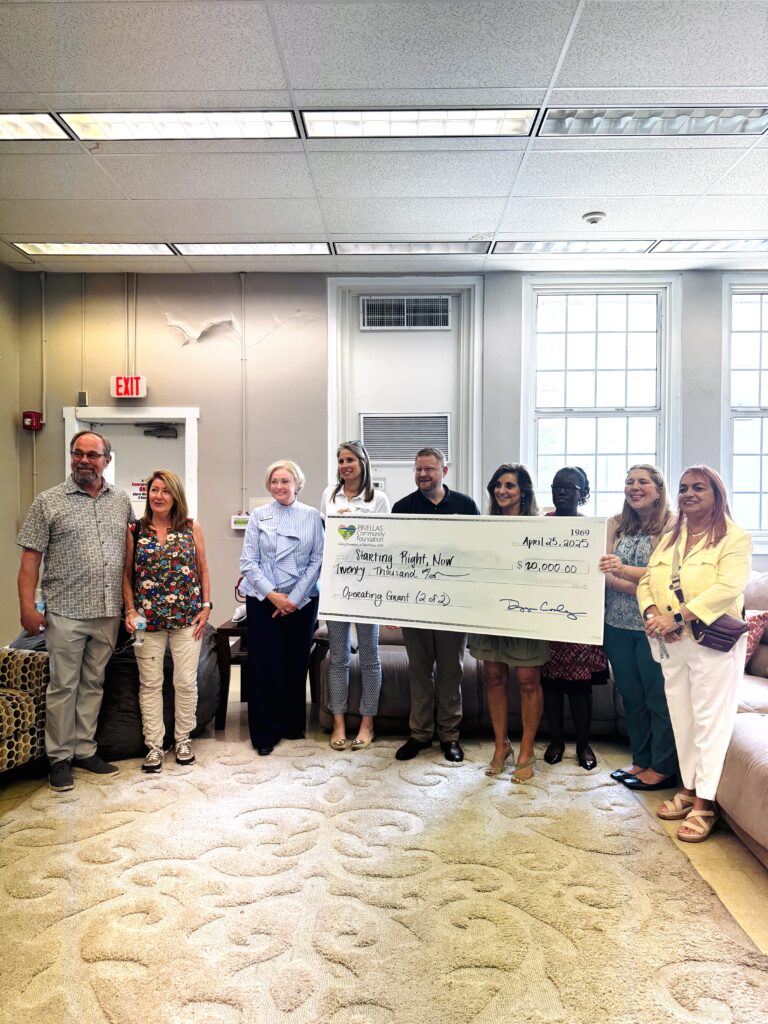 Starting Right, Now staff posing with Pinellas Community Foundation and a check presentation for an operating grant
