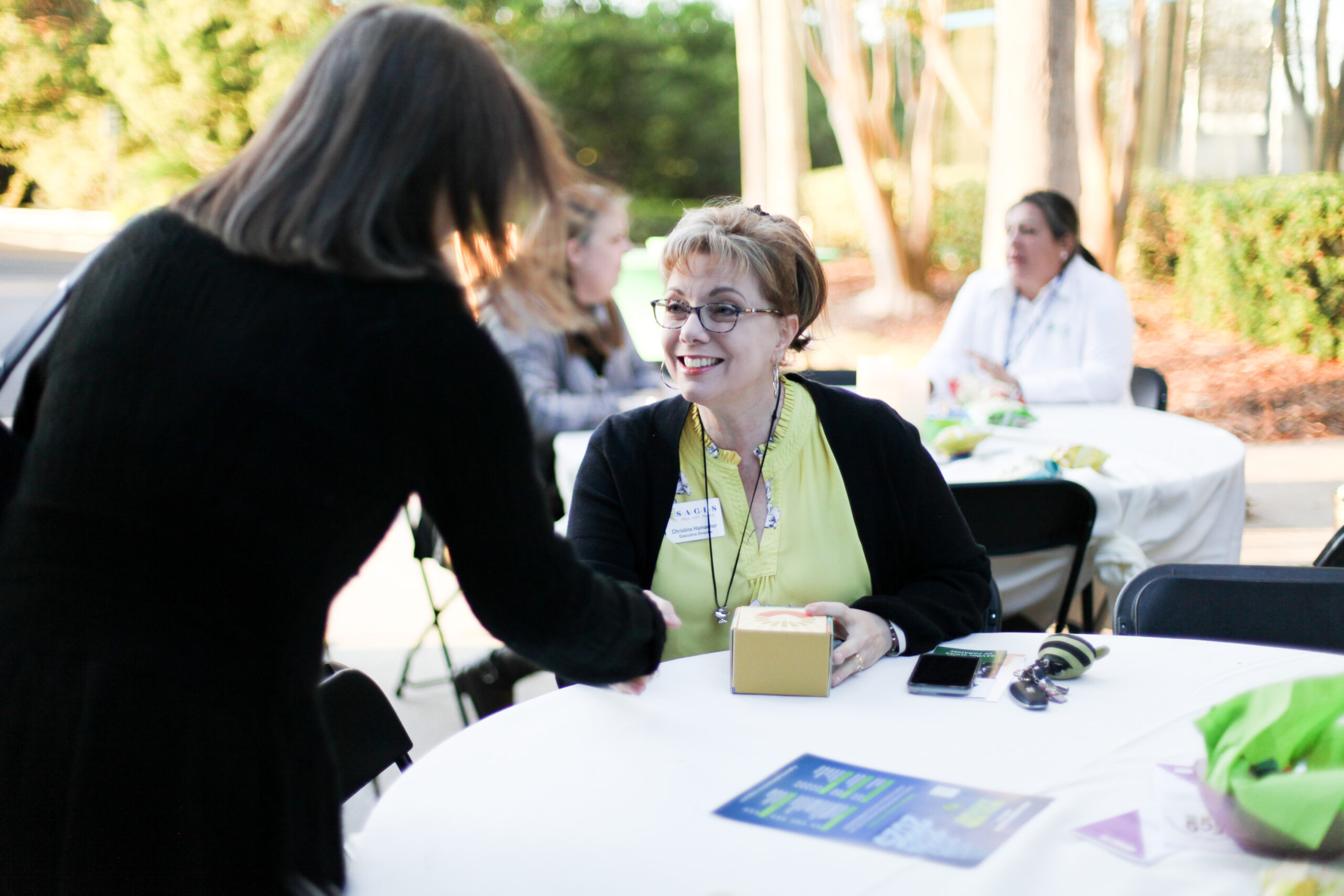 Donor Shaking Hands and Smiling