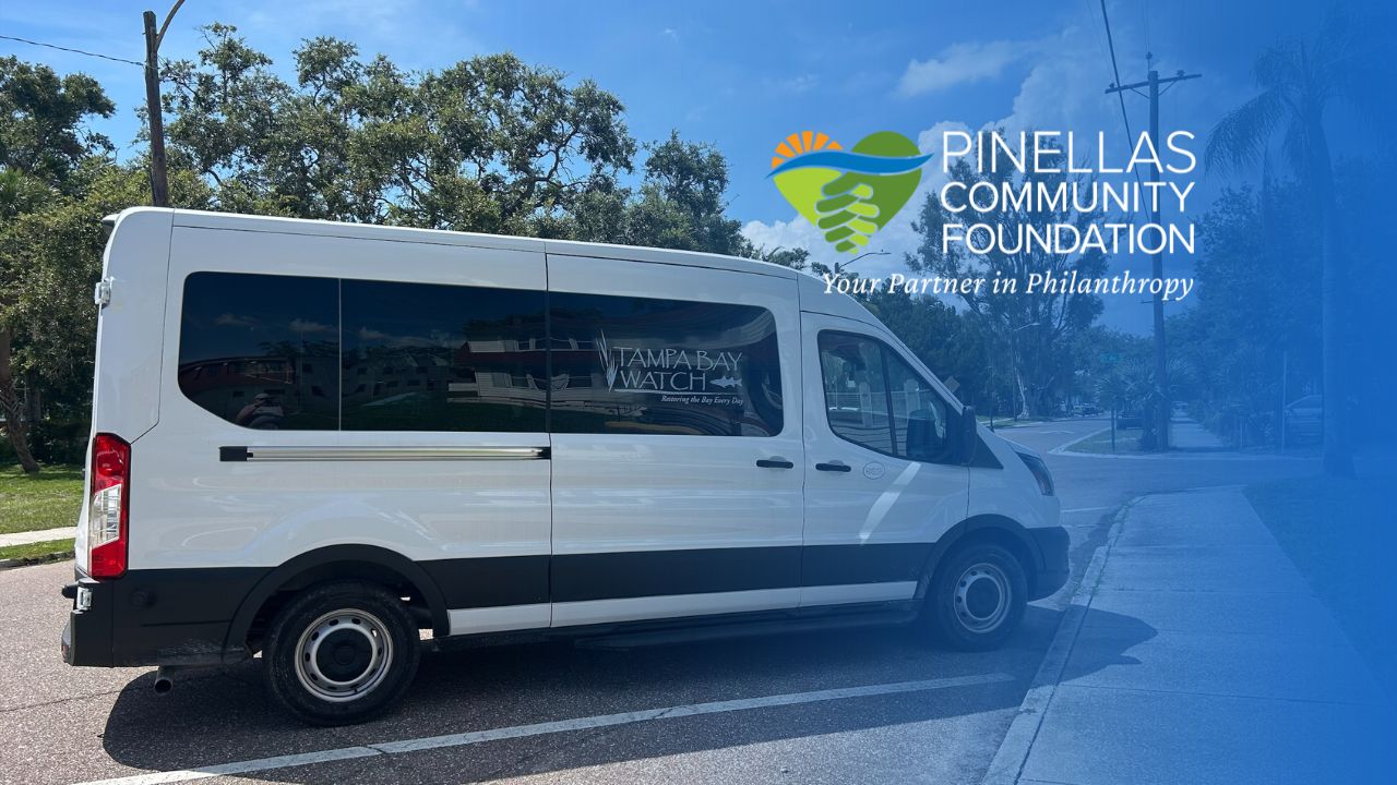White sprinter van with text that reads Tampa Bay Watch. Image overlayed with blue gradient featuring Pinellas Community Foundation logo