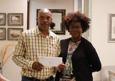 Walter Evans of Shihan School of Survival accepts a grant from Venture Philanthropy Fund Advisor J.A. Morton-Jones.